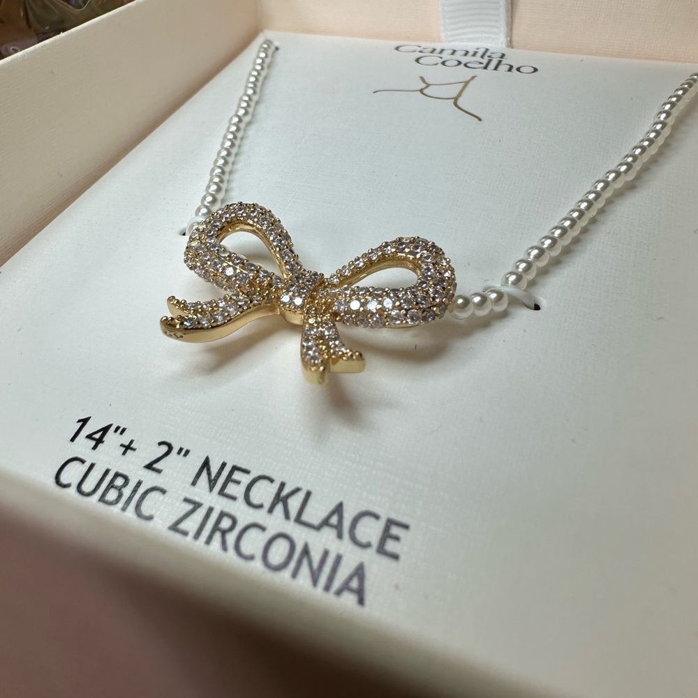 Camila Coelho Silver Cubic Zirconia Bow Necklace on strand of small faux pearls - Picture 4 of 10